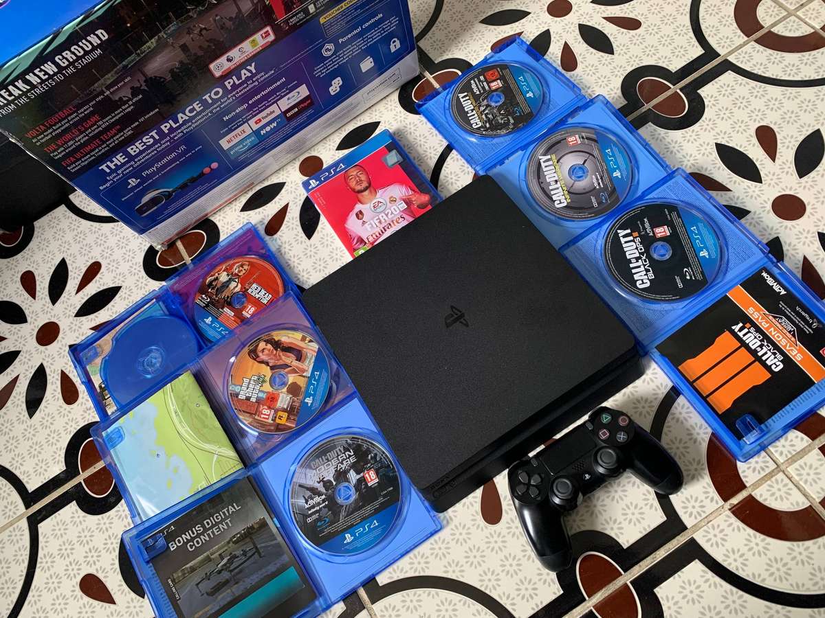 Sony PlayStation 4 Slim (500GB SSD)  Bundle with 7 Games + Accessories