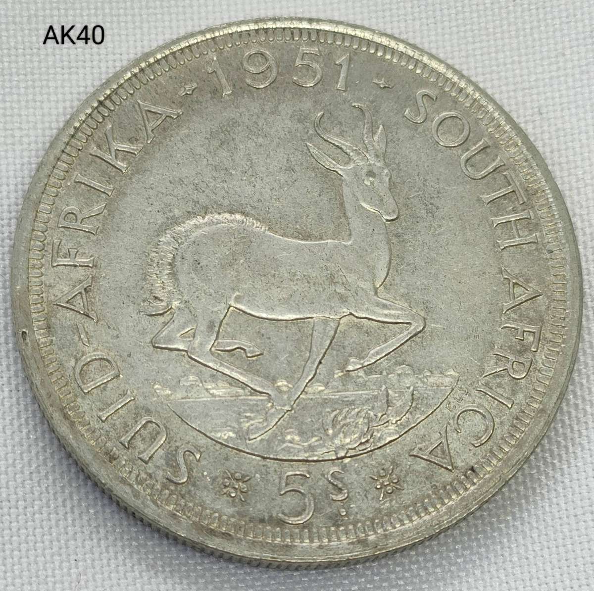 1951 Crown - 5 shillings- Union of South Africa- .500 silver- in capsule -A/UNC