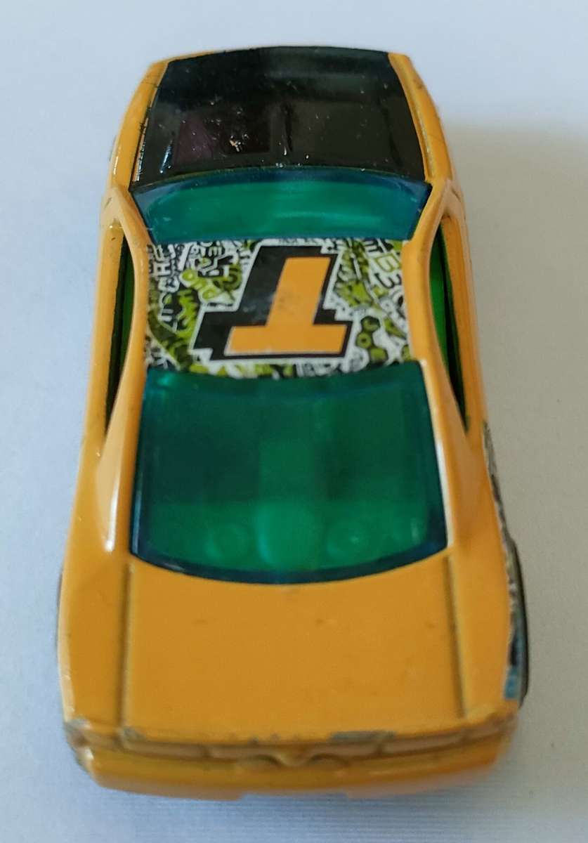 Racing car made in Malaysia 1,43 scale model: Metal die cast: Lovely condition: