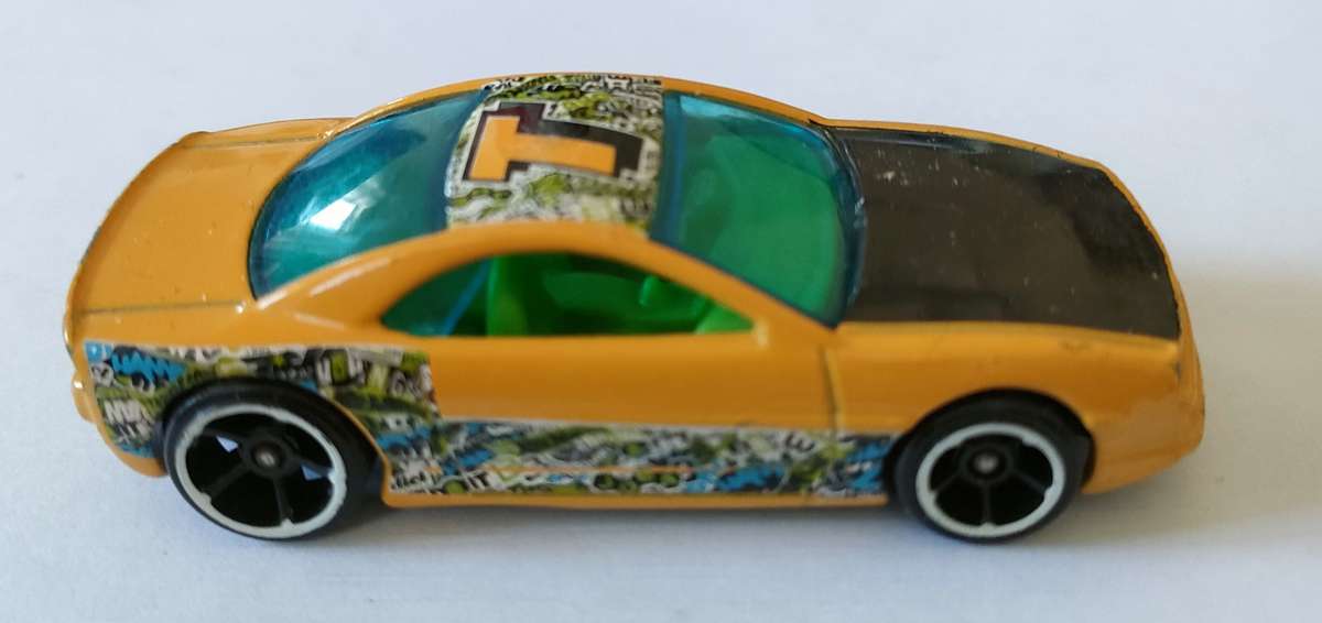 Racing car made in Malaysia 1,43 scale model: Metal die cast: Lovely condition: