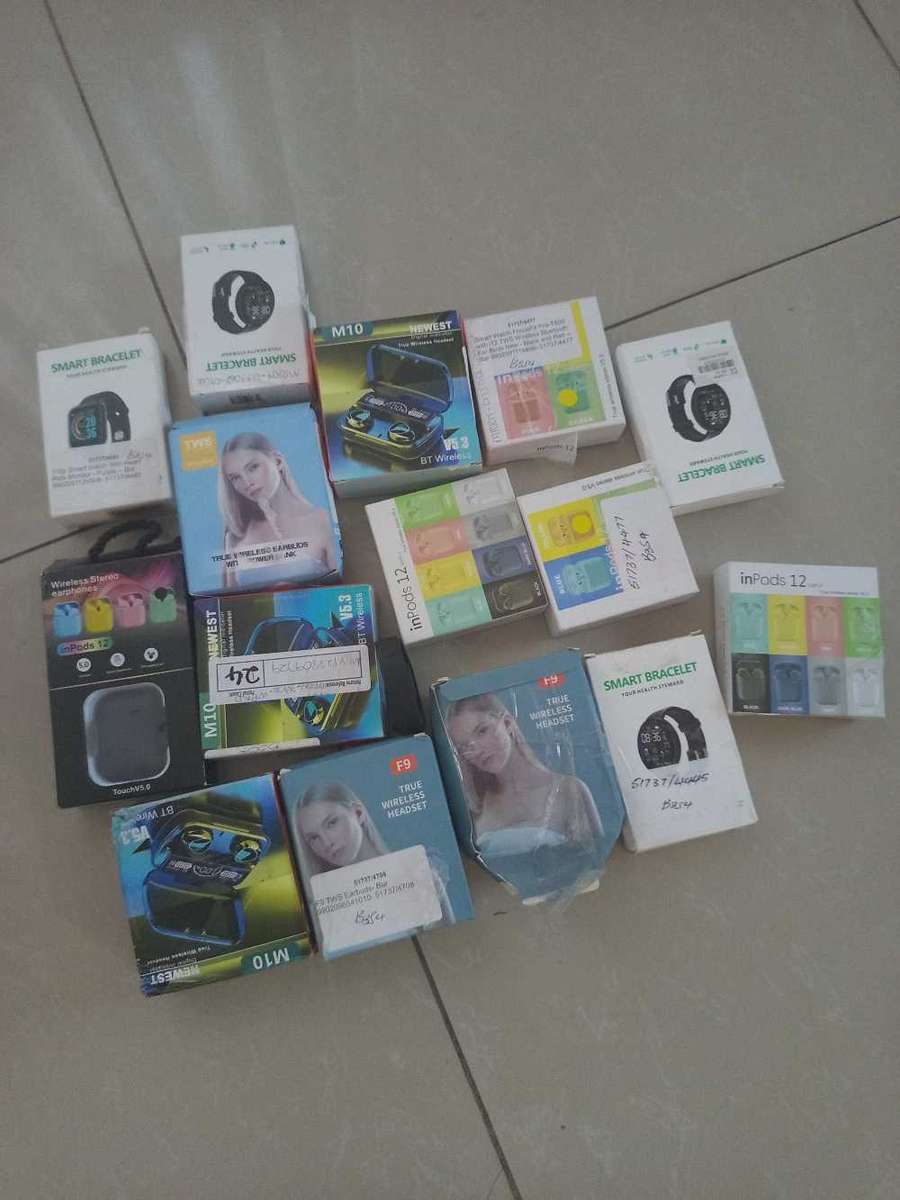 Bulk Lot of ear pods and smart watches