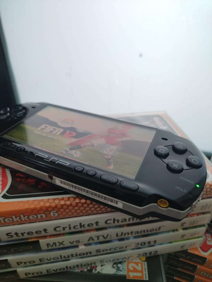Psp console + 15 Games (Of Your Choice)