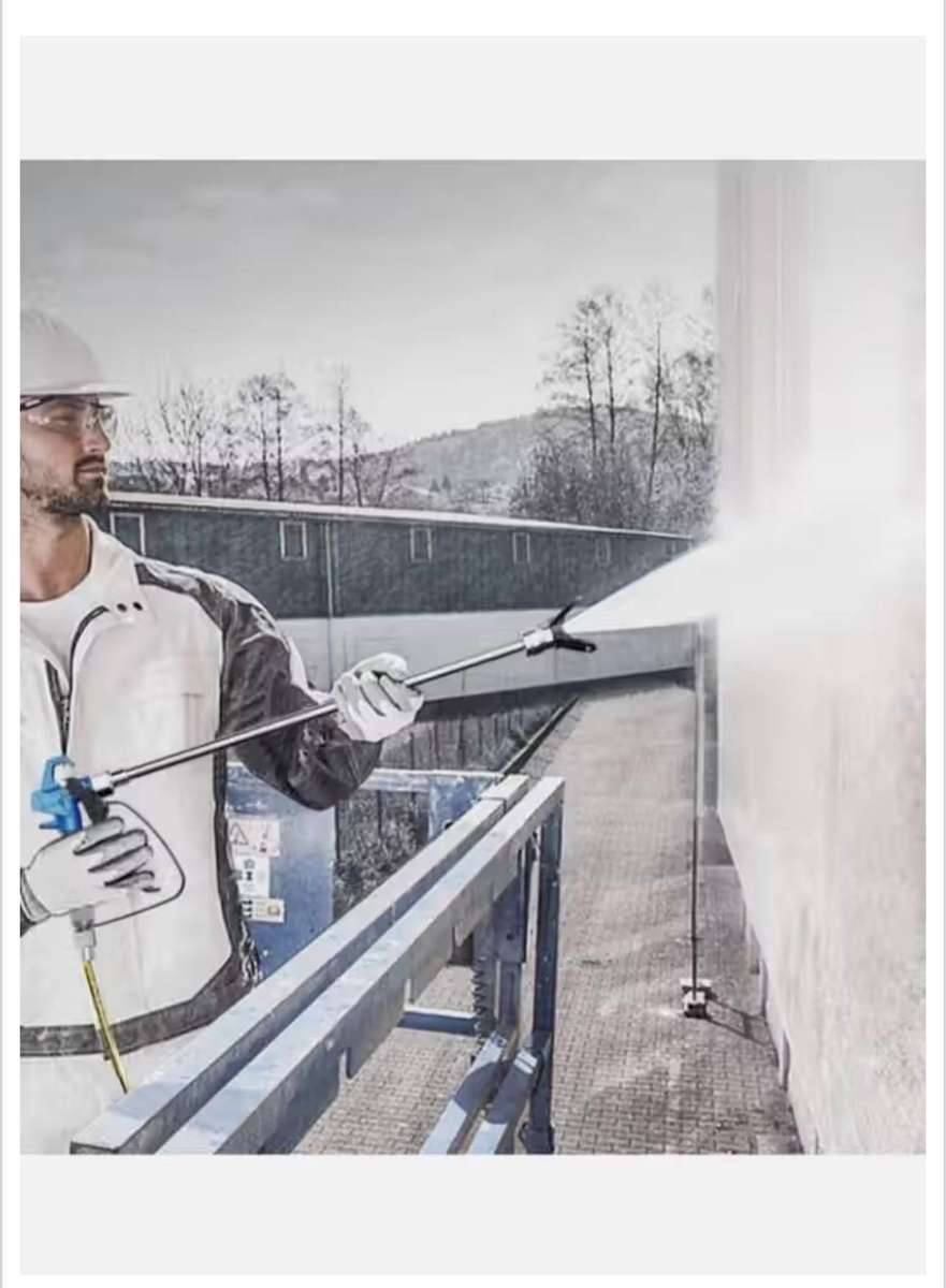 Spray painting machine