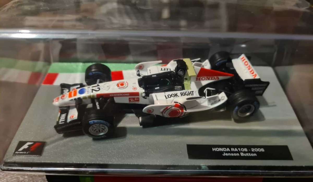 1:43 scale model of the Honda RA106, a Formula One car from the 2006 season