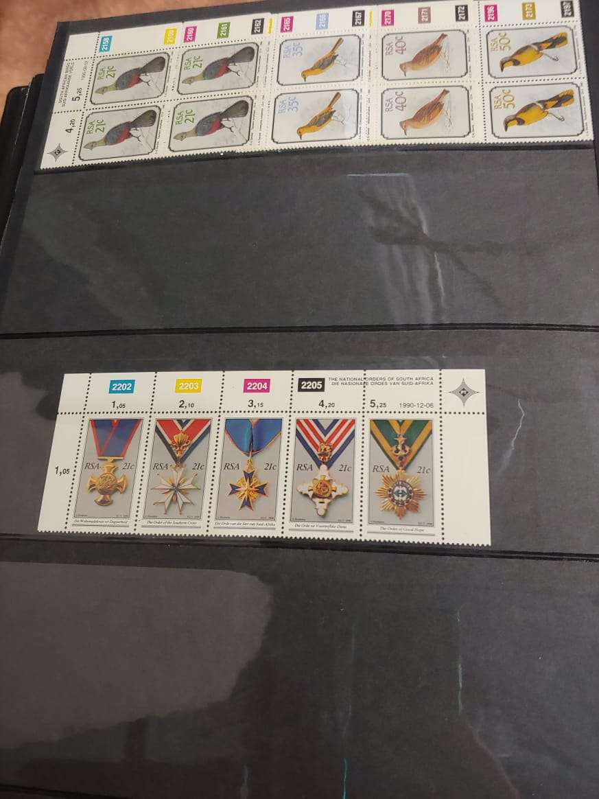 STAMP ALBUM WITH RSA STAMPS DATES FROM 1983 TO 1993