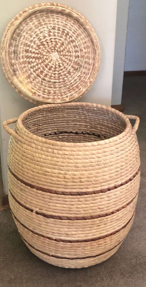 Hand woven laundry basket