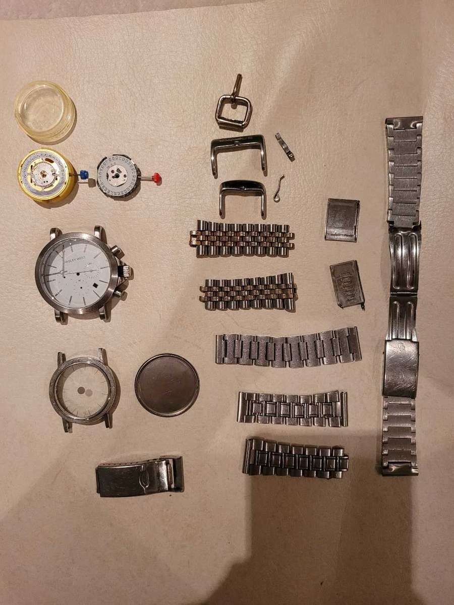 Lot of broken watch parts
