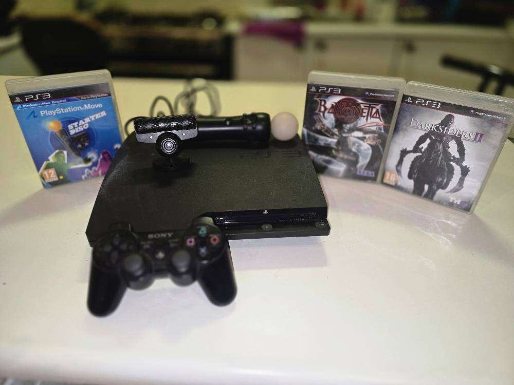 PlayStation 3 slim with original remote and PS move 30+ games