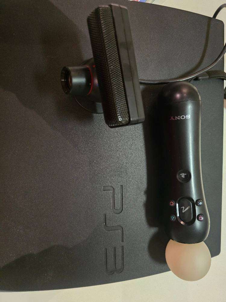 PlayStation 3 slim with original remote and PS move 30+ games