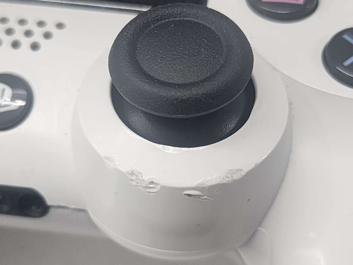 Sony PlayStation 4 Slim 500GB White Console Bundle + 2 Controllers + 7 Games