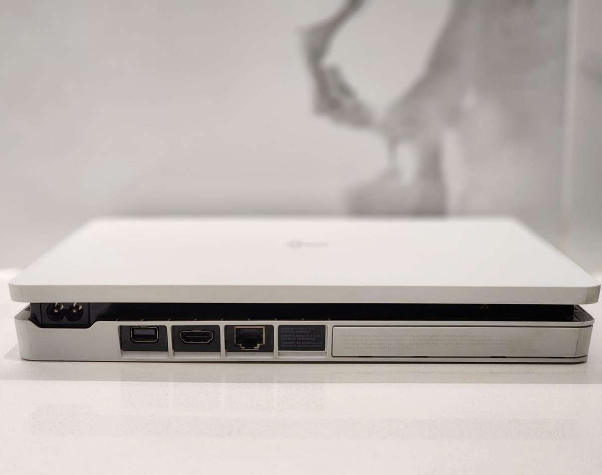 Sony PlayStation 4 Slim 500GB White Console Bundle + 2 Controllers + 7 Games