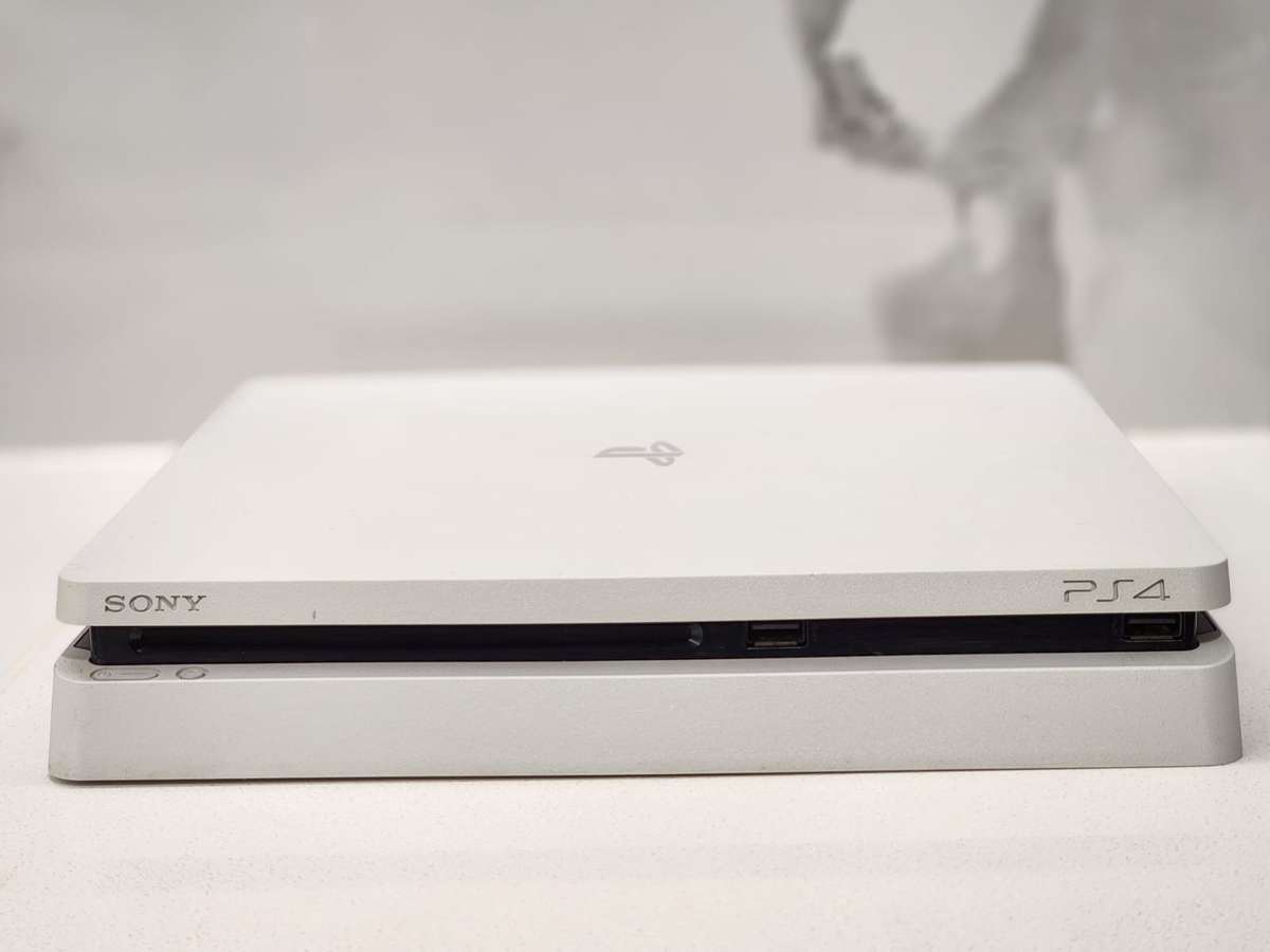 Sony PlayStation 4 Slim 500GB White Console Bundle + 2 Controllers + 7 Games