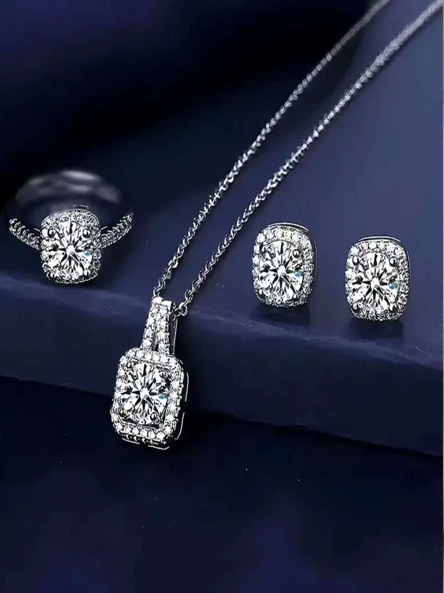 Gorgeous four piece jewelry set- Earrings, necklace, pendant and ring.
