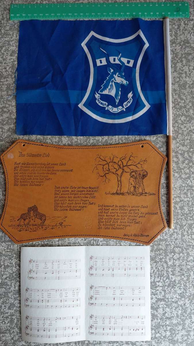 DAS SUDWESTER LIED - PRINTED ON GENUINE LEATHER & MUSICAL BOOKLET & WINDHOEK SCHOOL FLAG