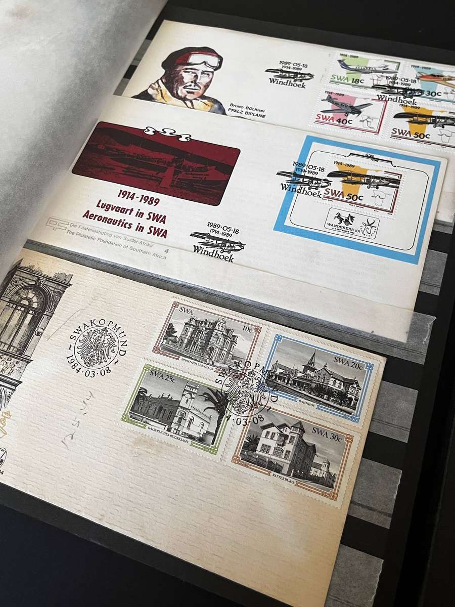  Mixed World Postage Stamp Collection  2 Albums (Incomplete)