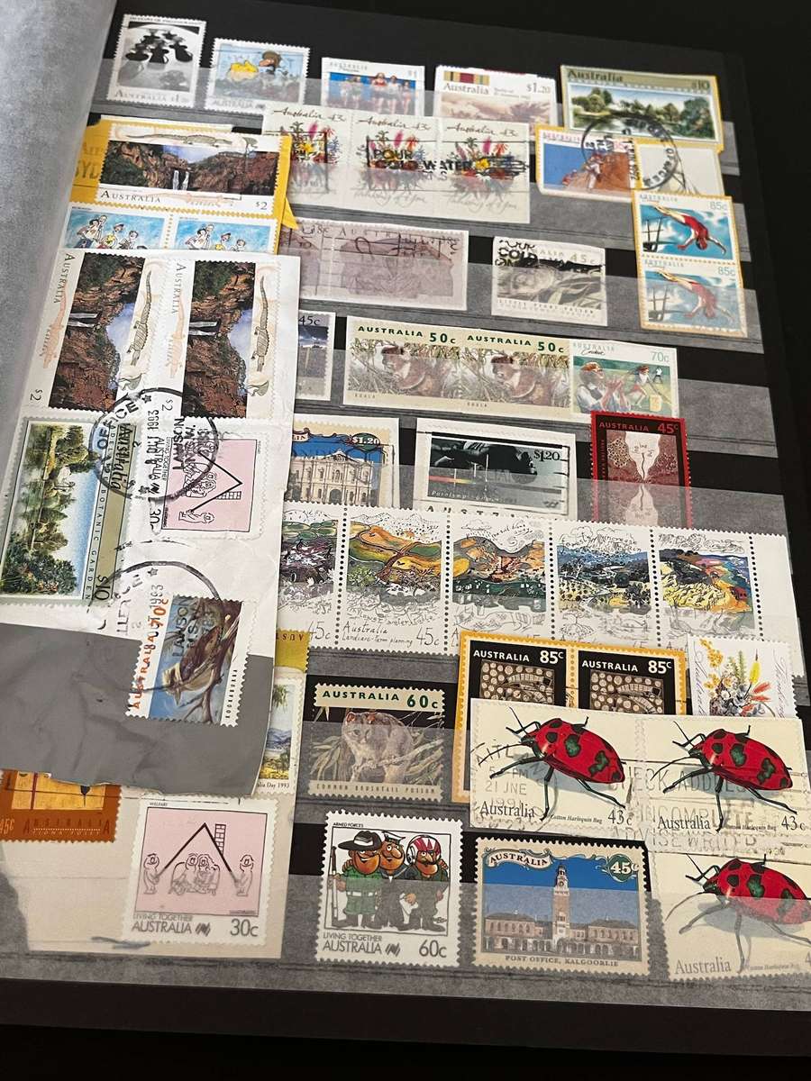  Mixed World Postage Stamp Collection  2 Albums (Incomplete)
