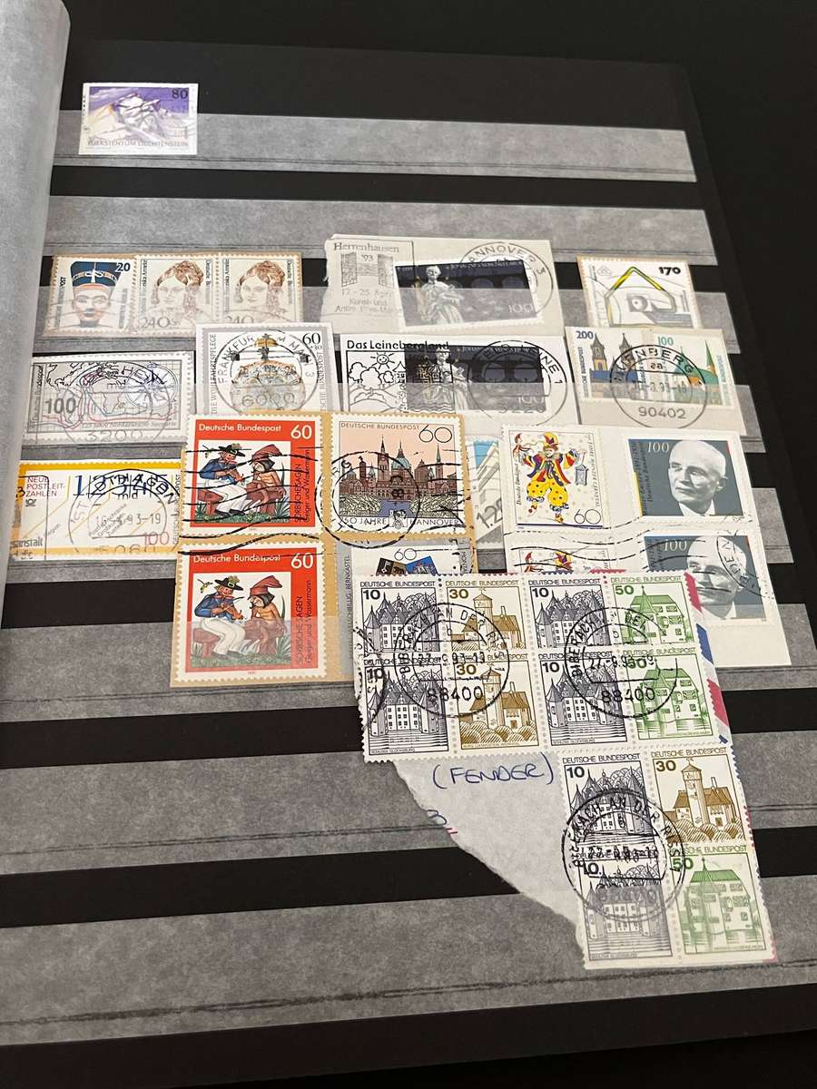  Mixed World Postage Stamp Collection  2 Albums (Incomplete)