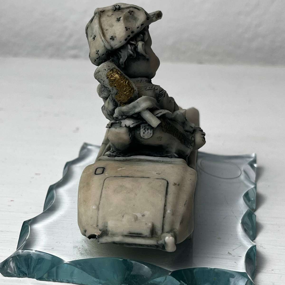 Vintage Boy in Car Figurine on Glass Base 10cm