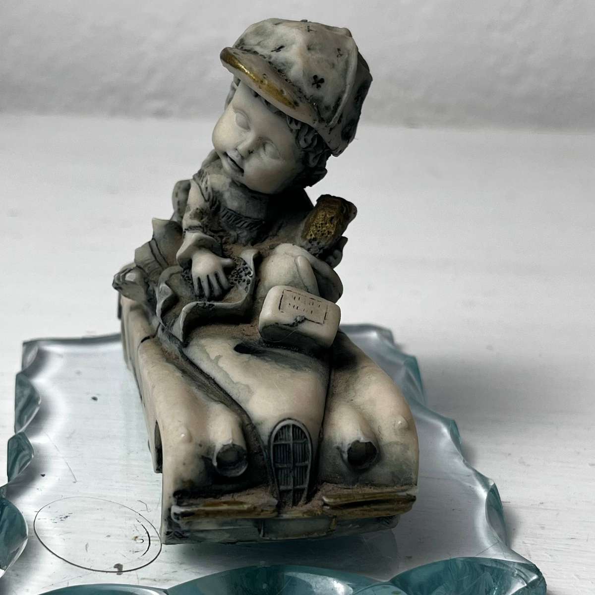 Vintage Boy in Car Figurine on Glass Base 10cm