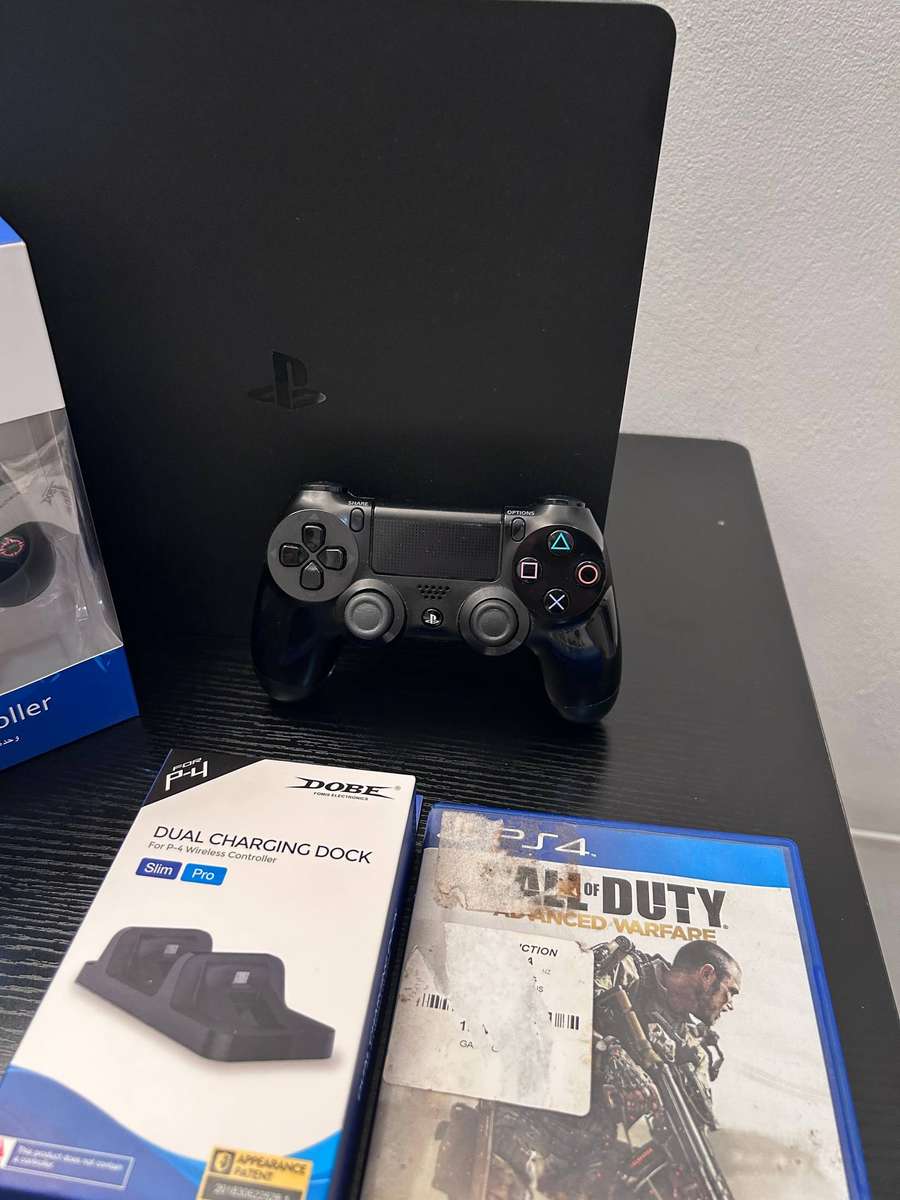 PlayStation 4 Slim 500GB Console Bundle with 2 Controllers and Dual Charging Dock