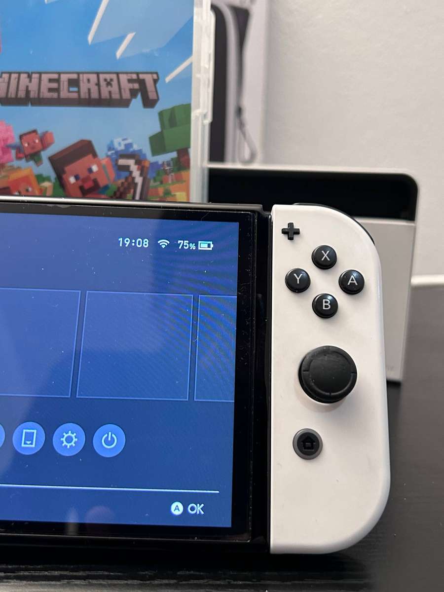 Nintendo Switch OLED White Bundle - Minecraft, Carrying Case & Comfort Grip