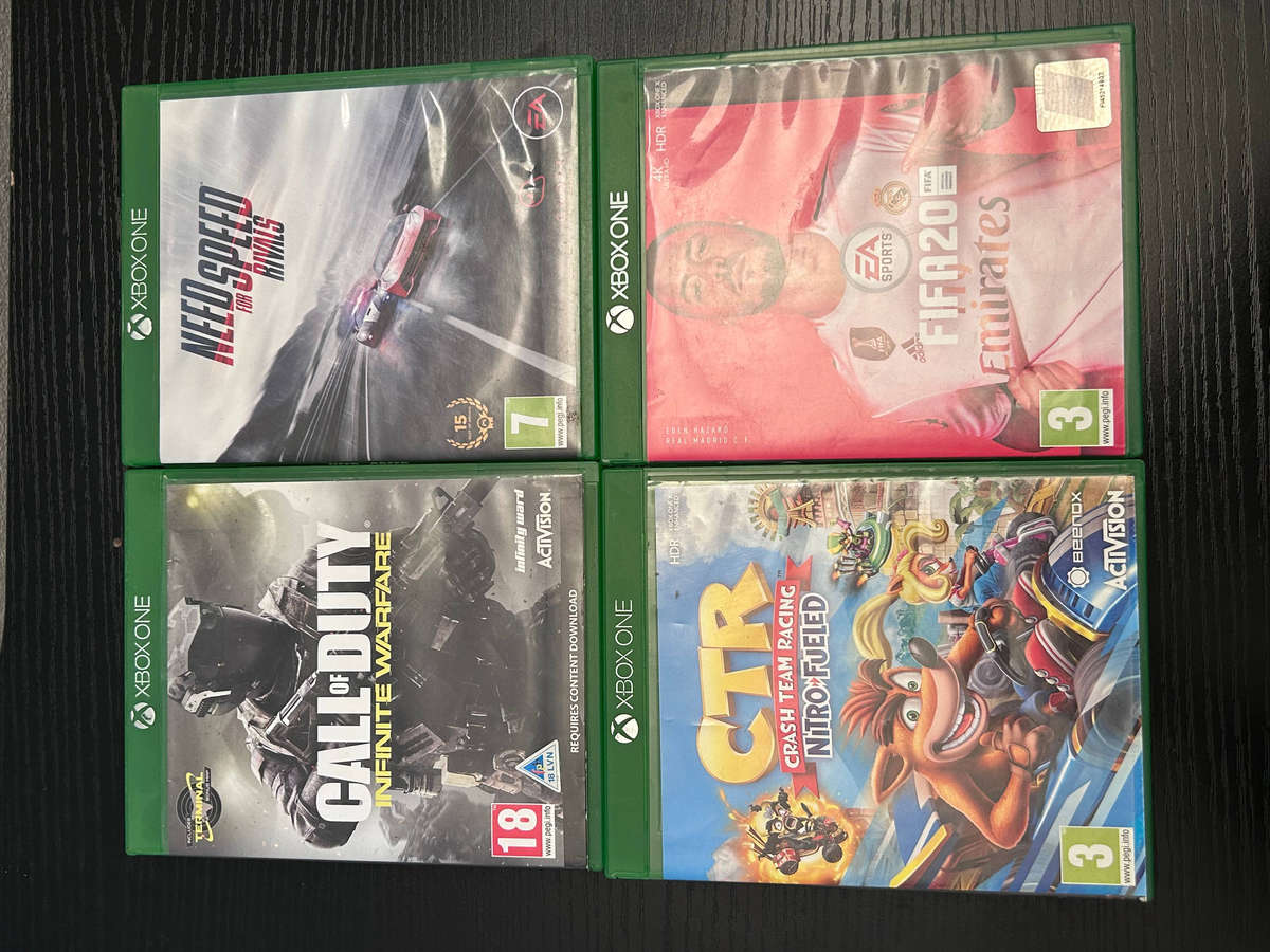 Microsoft Xbox One S 500GB Console Bundle  Includes 4 Games & Cables