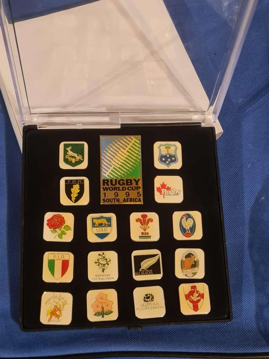 17 collectible rugby pins