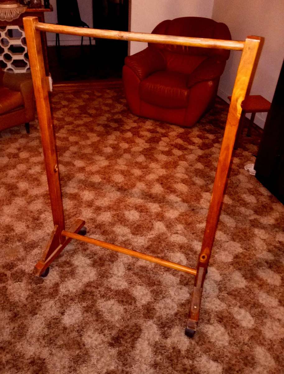 Wooden clothes rail with wheels