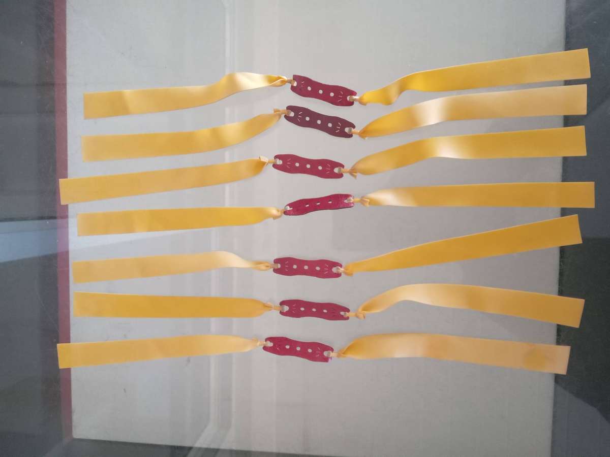 LOOSE RUBBERS FLAT FOR SLINGSHOTS- ONE LOT 0F 7 RUBBERS
