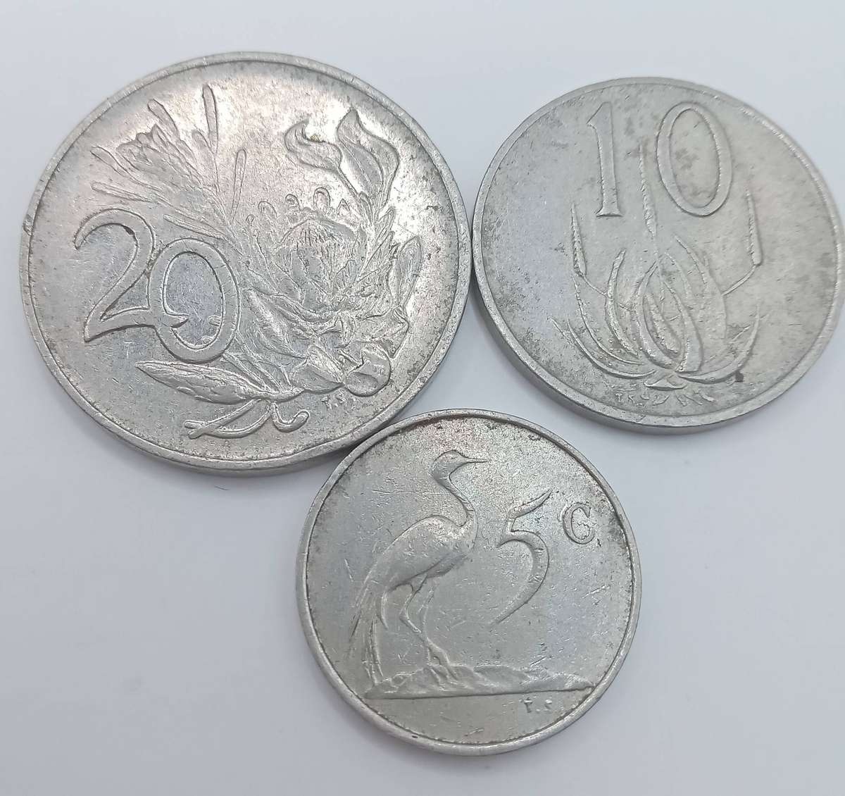 THREE RSA COINS: 1 X 1980 X 20 CENT, 1 X 1984 X 10 CENT AND 1 X 1979 X 5 CENT- ONE BID TAKES ALL
