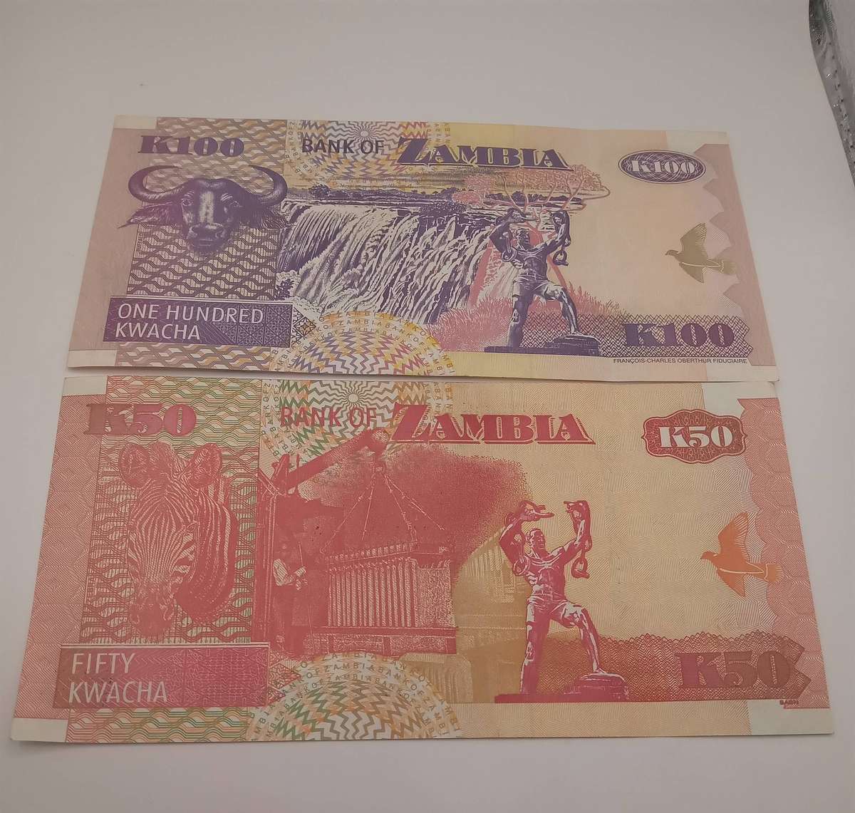 ZAMBIA 1 X 2007 X 50 KWACHA AND 1 X 2006 X 100 KWACHA - UNC - ONE BID TAKES BOTH