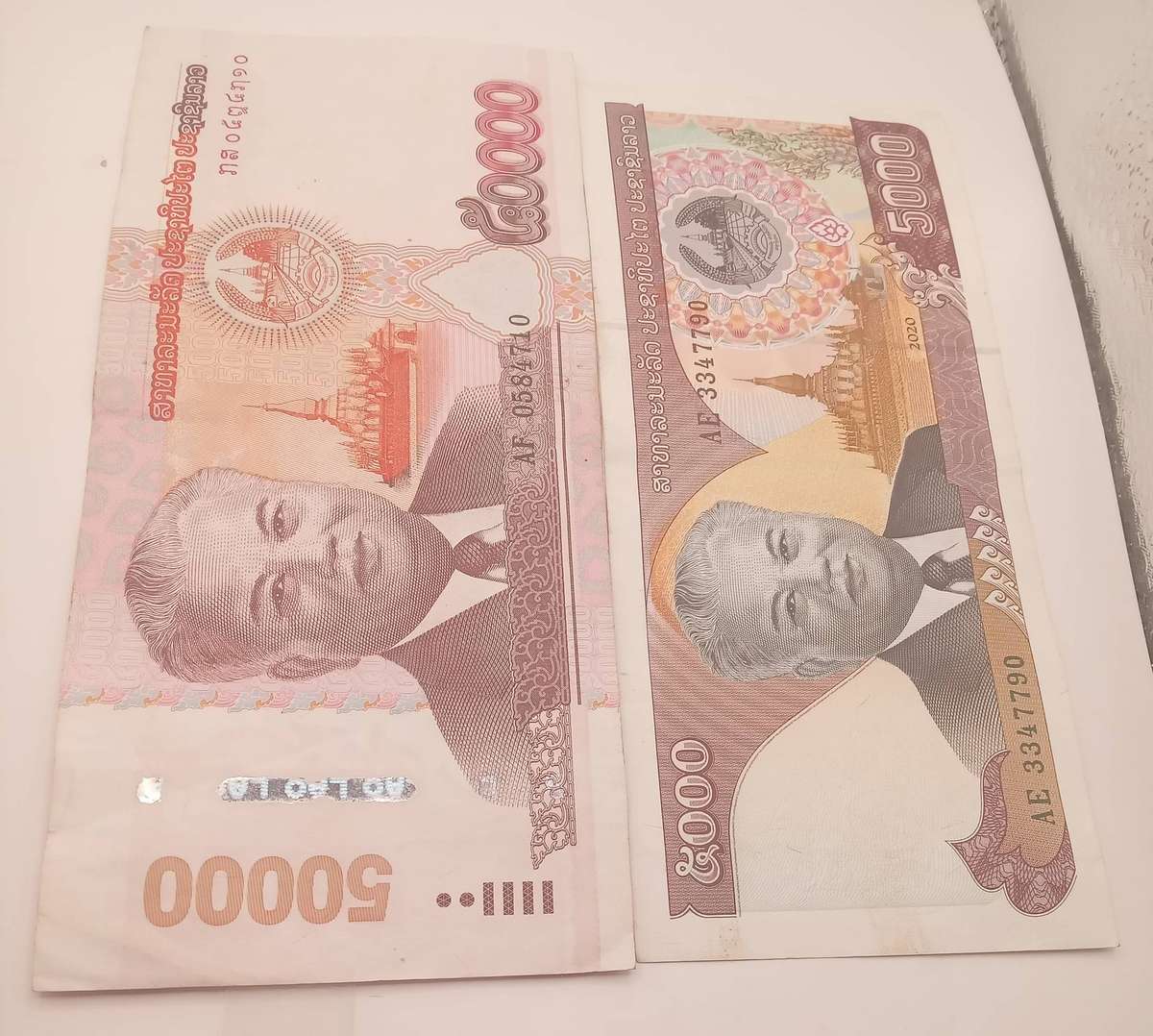 TWO LAOS RIP BANK NOTES - 1 X 5000 AND 1 X 50000 RIP