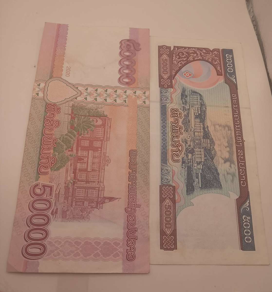TWO LAOS RIP BANK NOTES - 1 X 5000 AND 1 X 50000 RIP