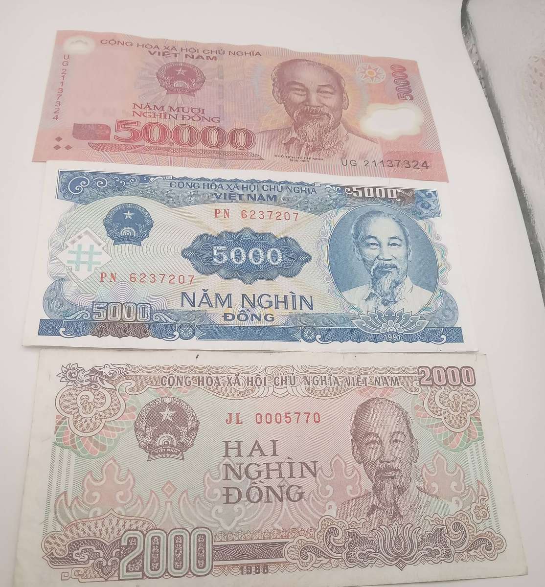 THREE VIETNAM BANKNOTES : 1X 2000 DONG, 1 X 5000 DONG AND 1 X 50000 DONG- UNC CONDITION