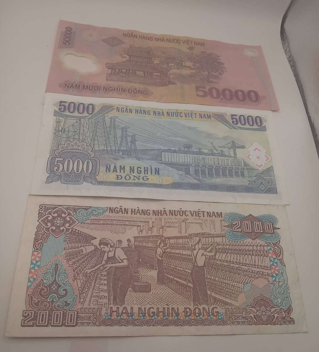 THREE VIETNAM BANKNOTES : 1X 2000 DONG, 1 X 5000 DONG AND 1 X 50000 DONG- UNC CONDITION