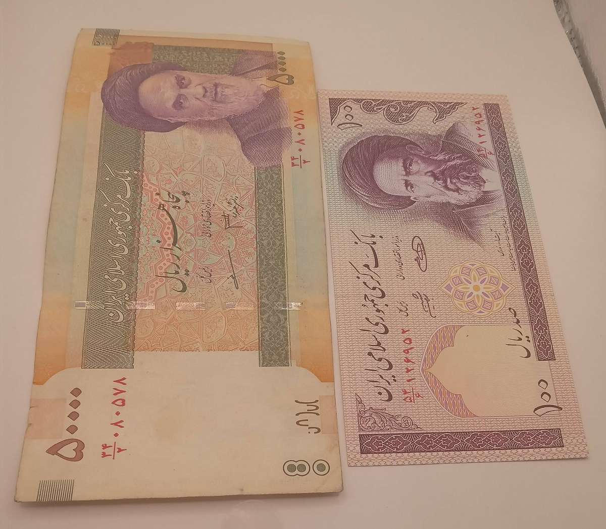 TWO IRAN RIALS BANK NOTES- 1 X 100 RIALS AND 1 X 50000 RIALS