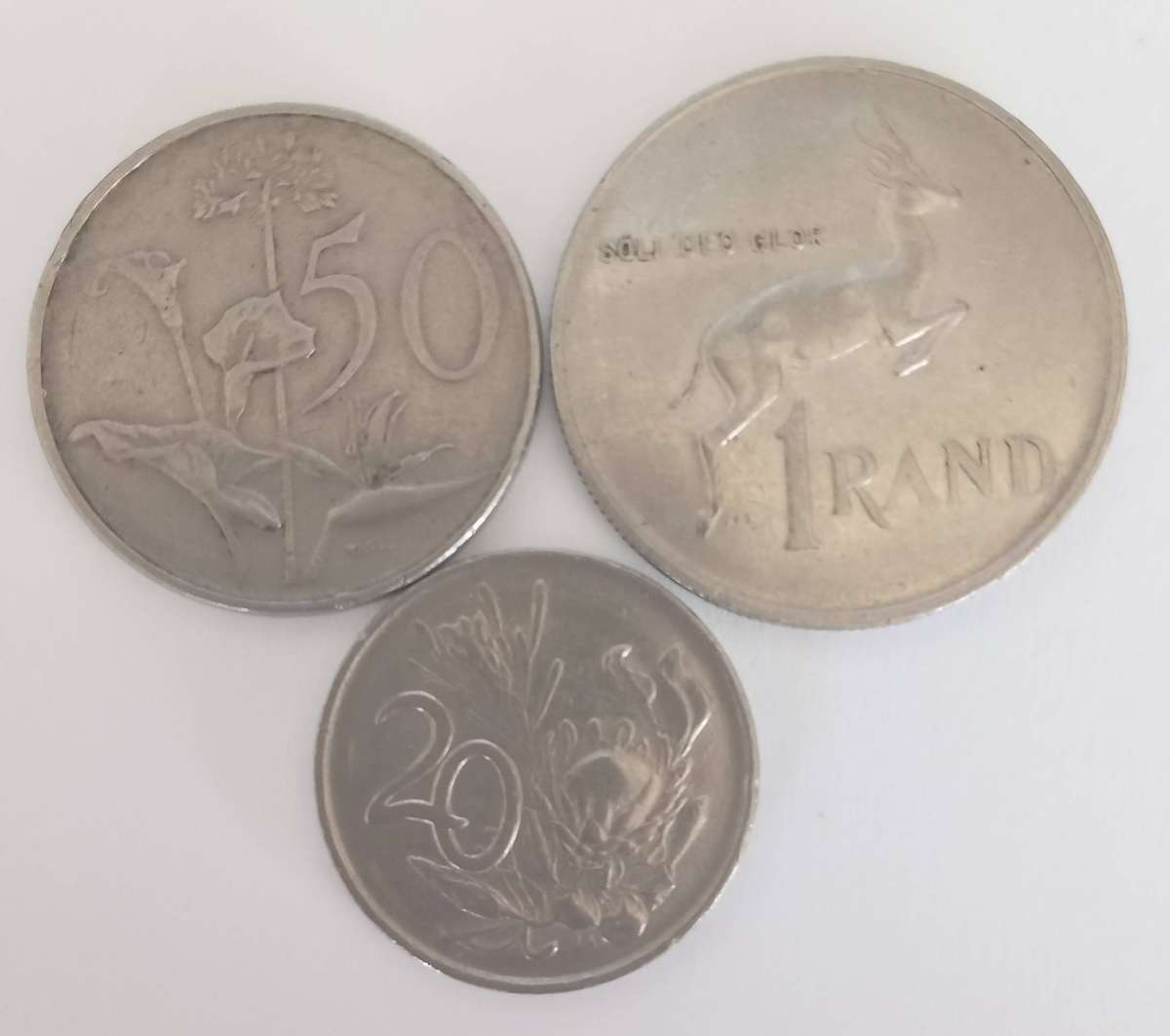 THREE SA COINS: 1 X 1988 X ONE RAND, 1 X 1977 X FIFTY CENTS AND 1 X 1975 X TWENTY CENTS