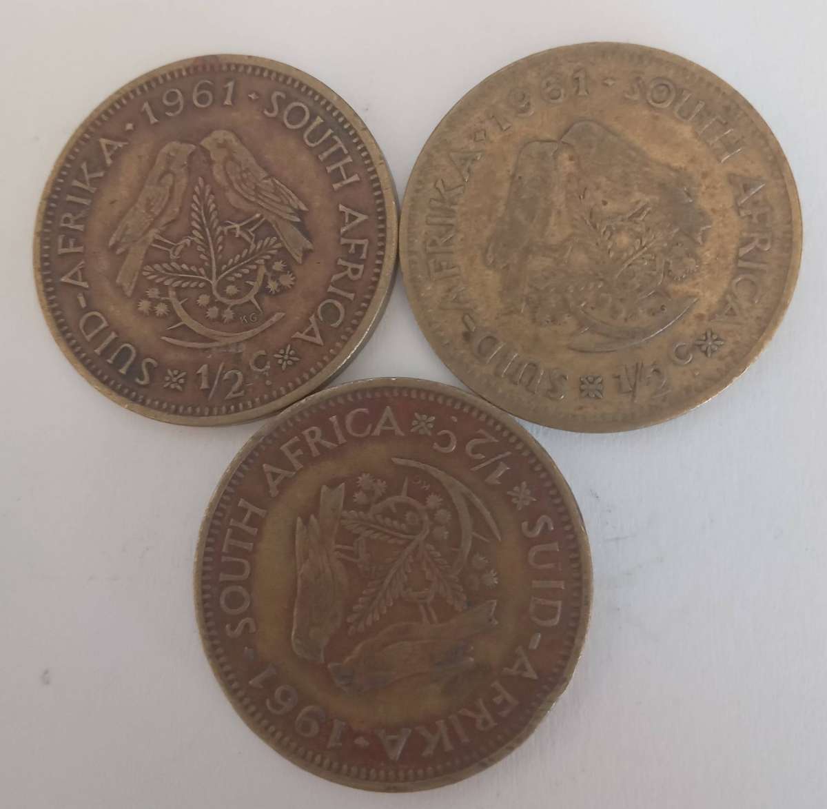 THREE 1961 SA OLD HALF CENT COINS