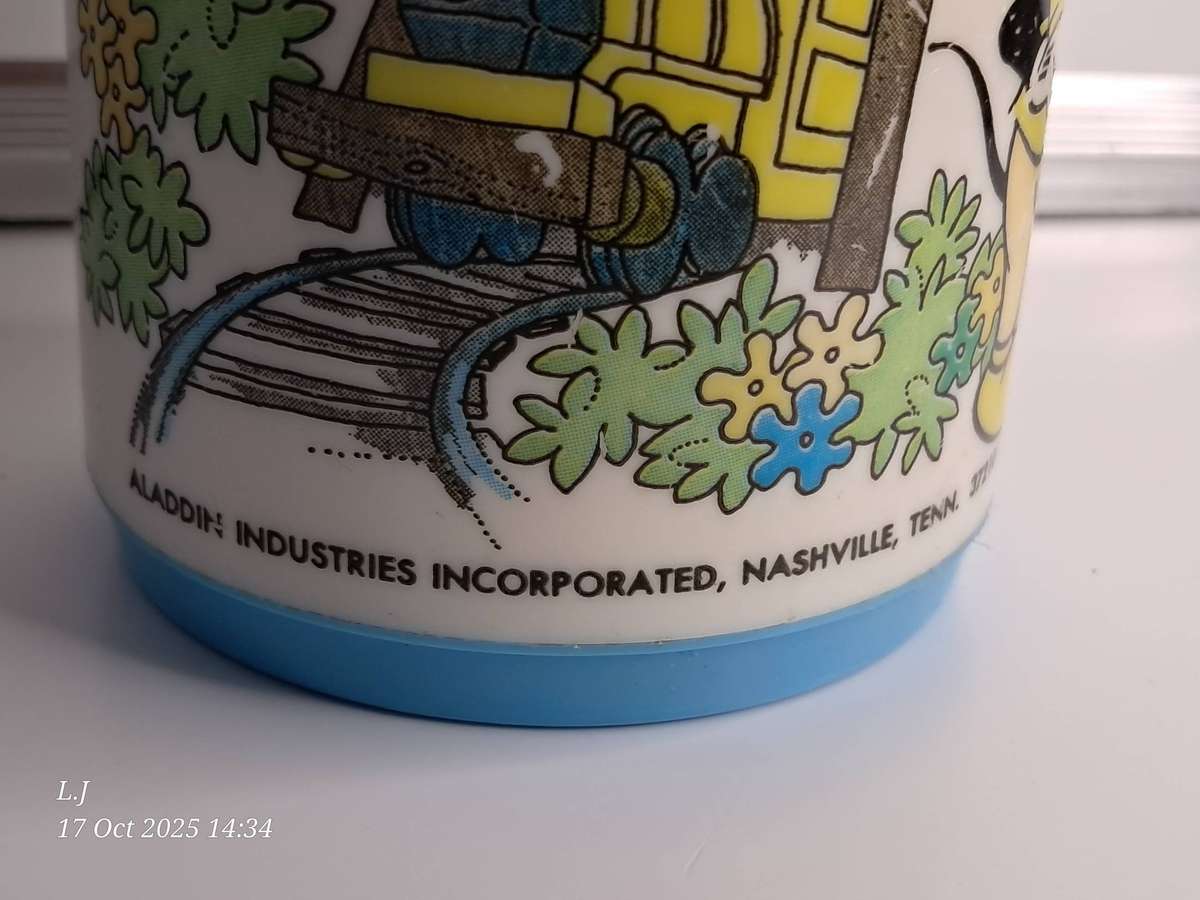 Vintage 1979 Walt Disney Magic Kingdom Thermos bottle made by Aladdin.