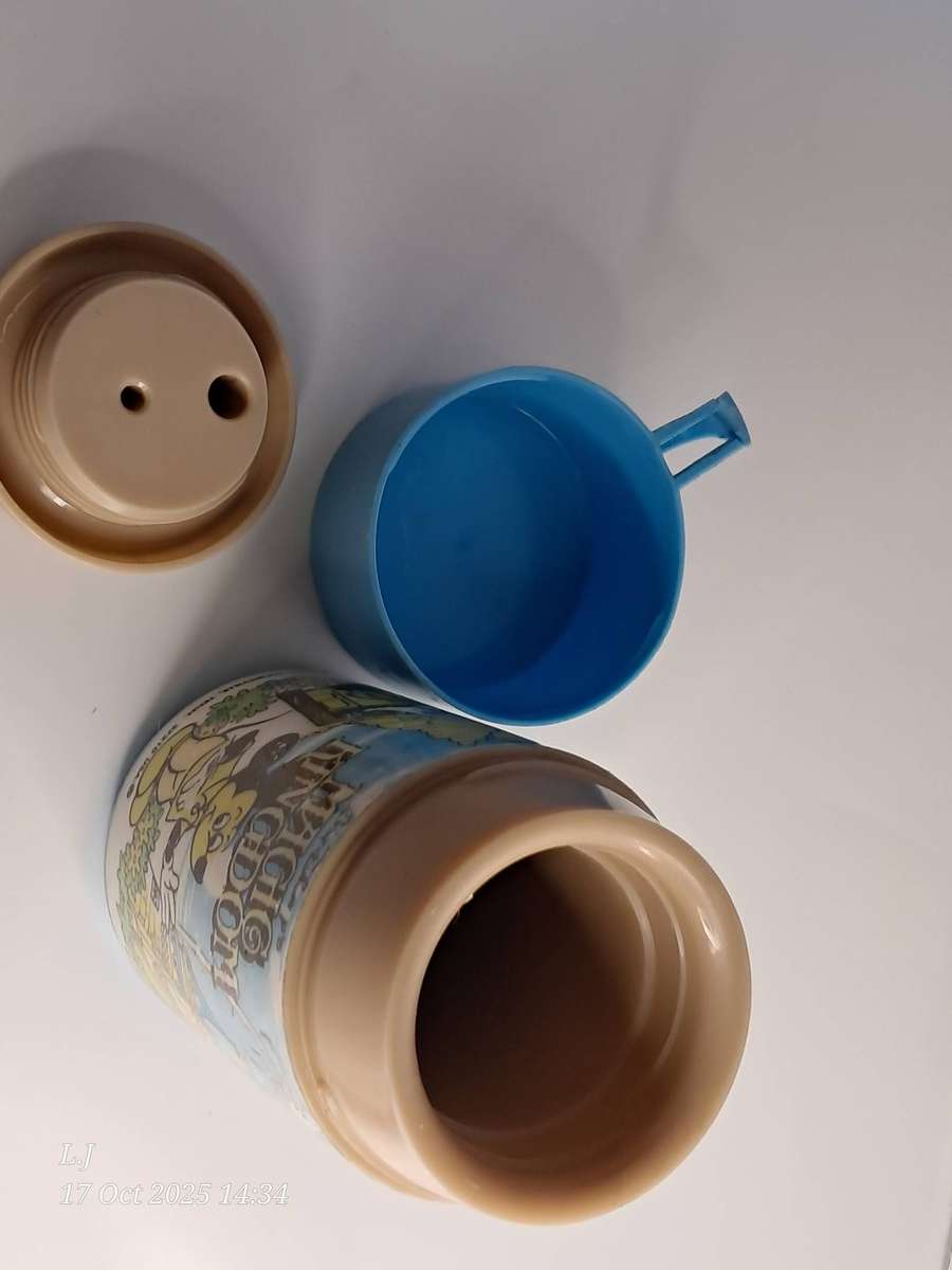 Vintage 1979 Walt Disney Magic Kingdom Thermos bottle made by Aladdin.