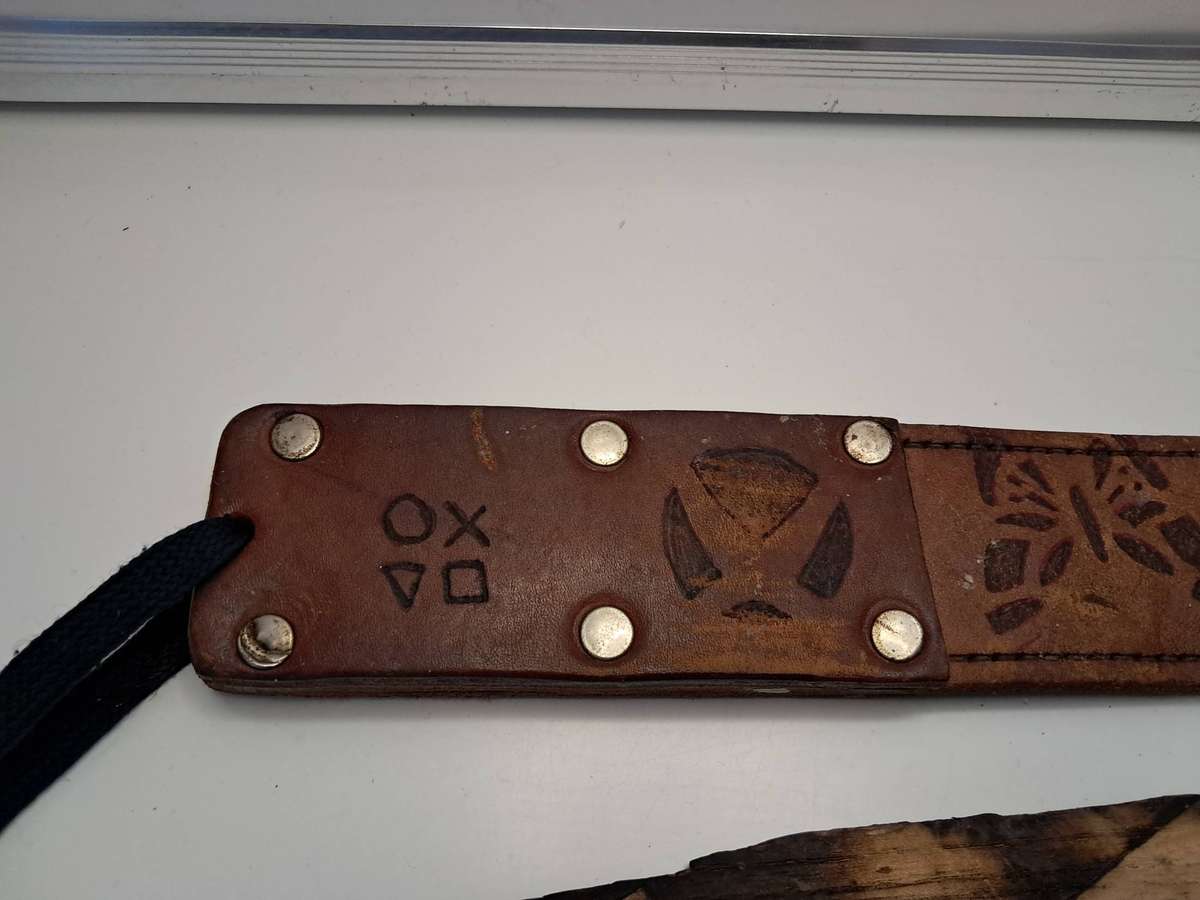Old Leather strap / Rubber brush / Wood sword decor