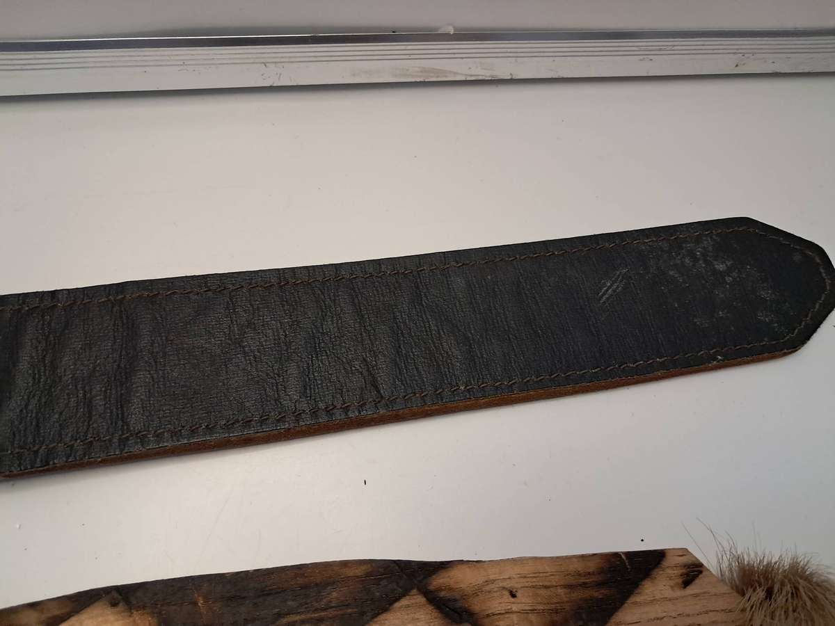 Old Leather strap / Rubber brush / Wood sword decor