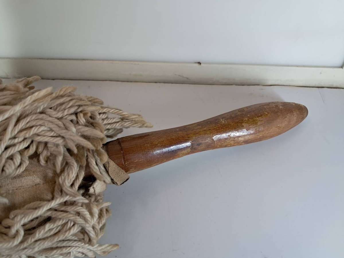 Vintage Magi mop in a tin