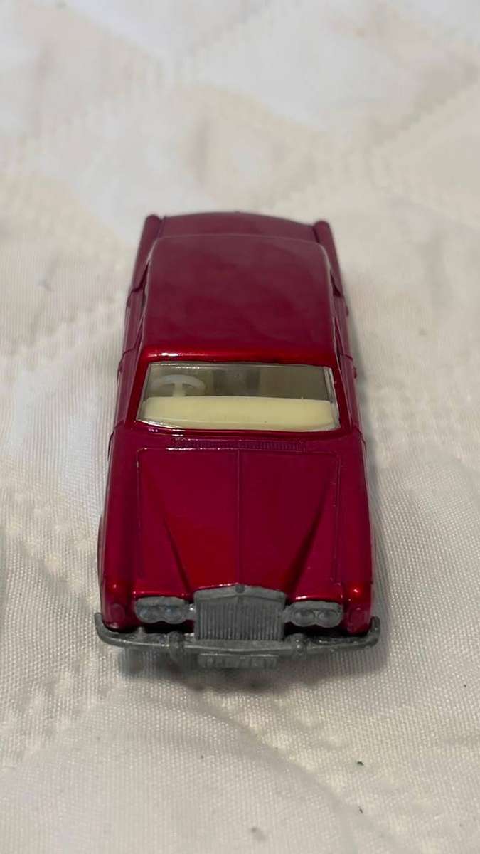 Vintage 1960s Matchbox Lesney Rolls-Royce Silver Shadow in red.