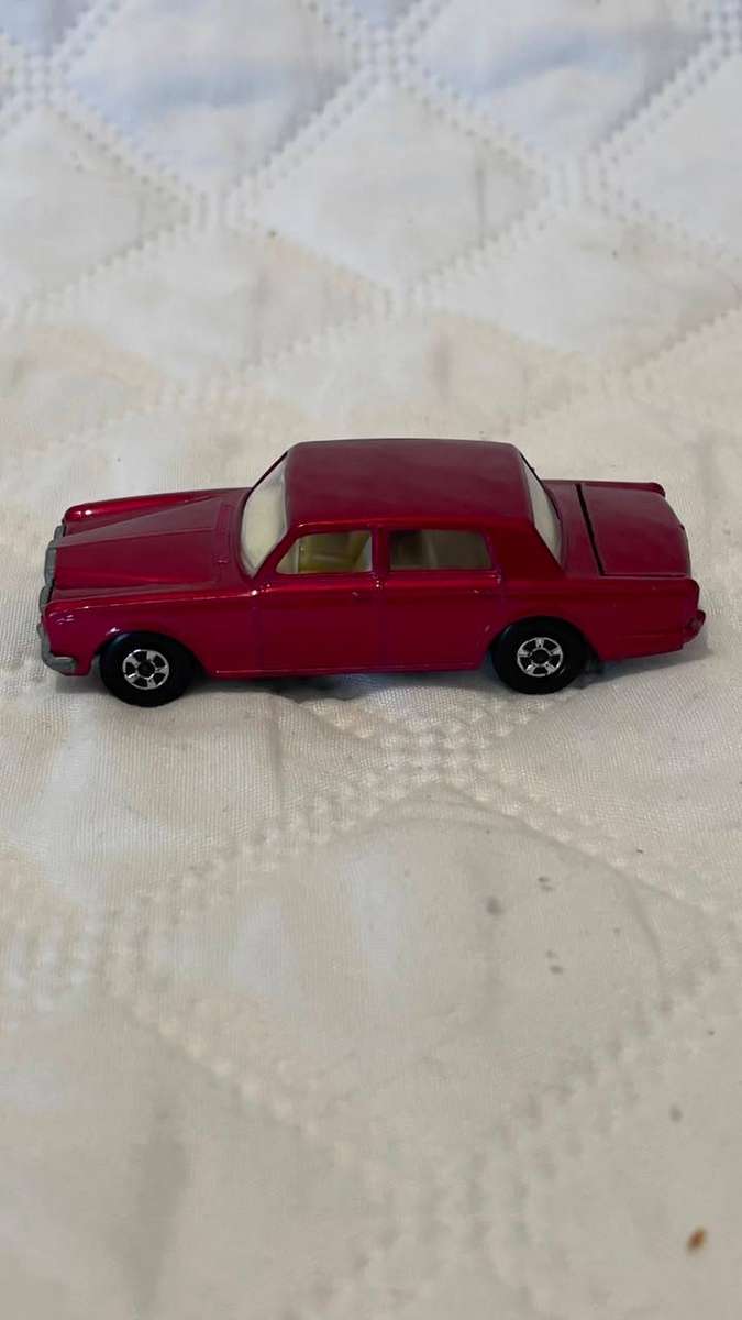 Vintage 1960s Matchbox Lesney Rolls-Royce Silver Shadow in red.