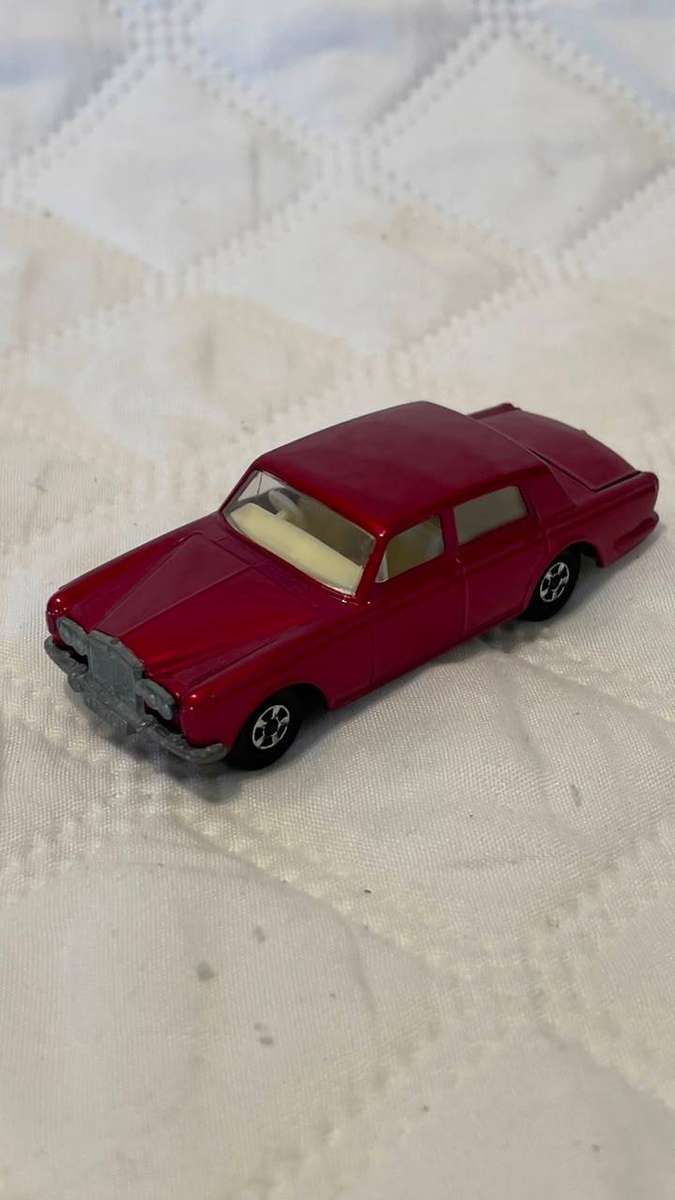 Vintage 1960s Matchbox Lesney Rolls-Royce Silver Shadow in red.