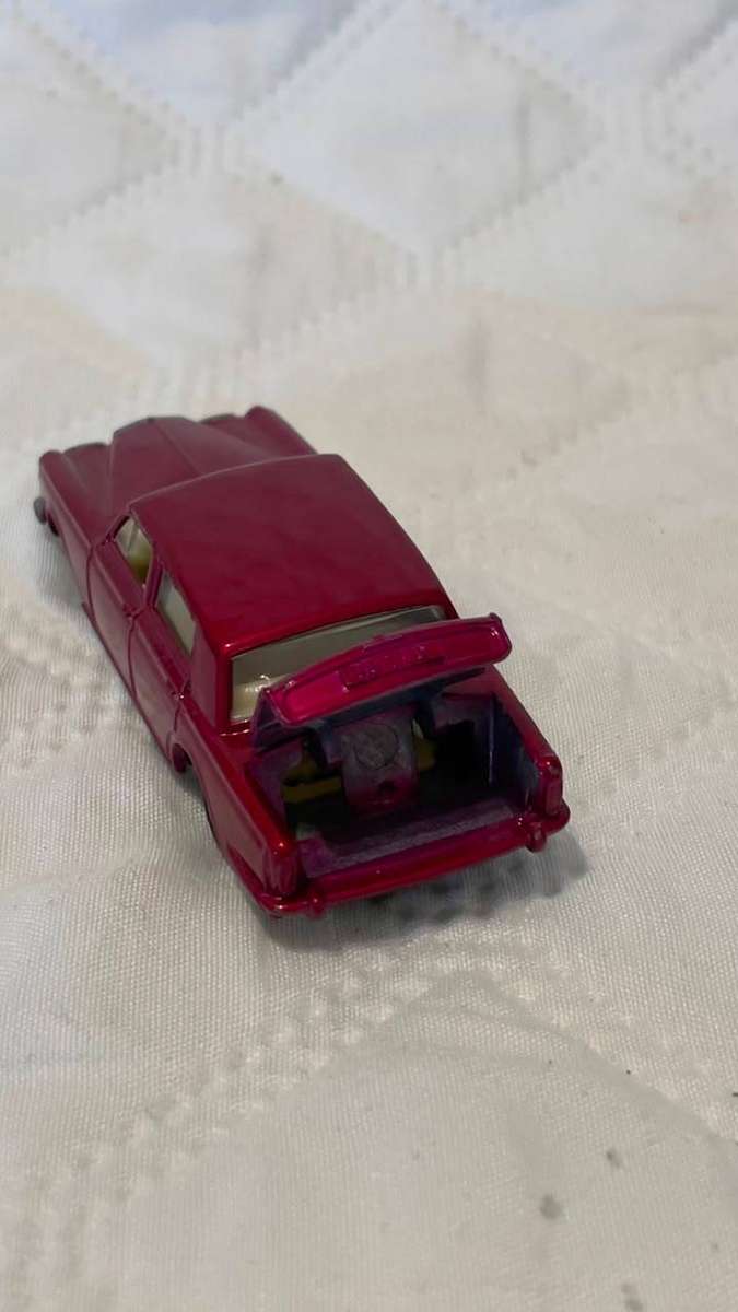 Vintage 1960s Matchbox Lesney Rolls-Royce Silver Shadow in red.