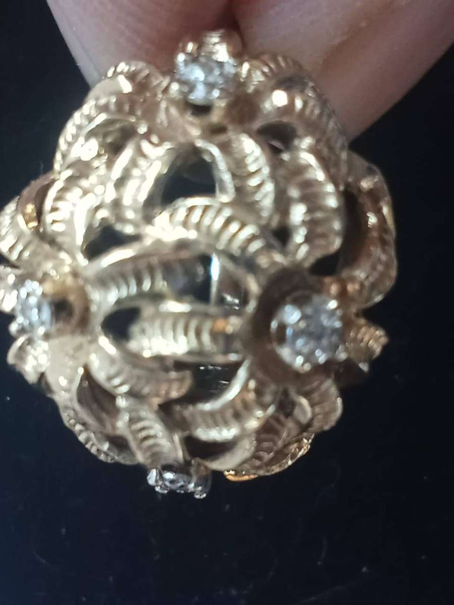 9kt yellow gold dress ring, set with 4 x single cut diamonds