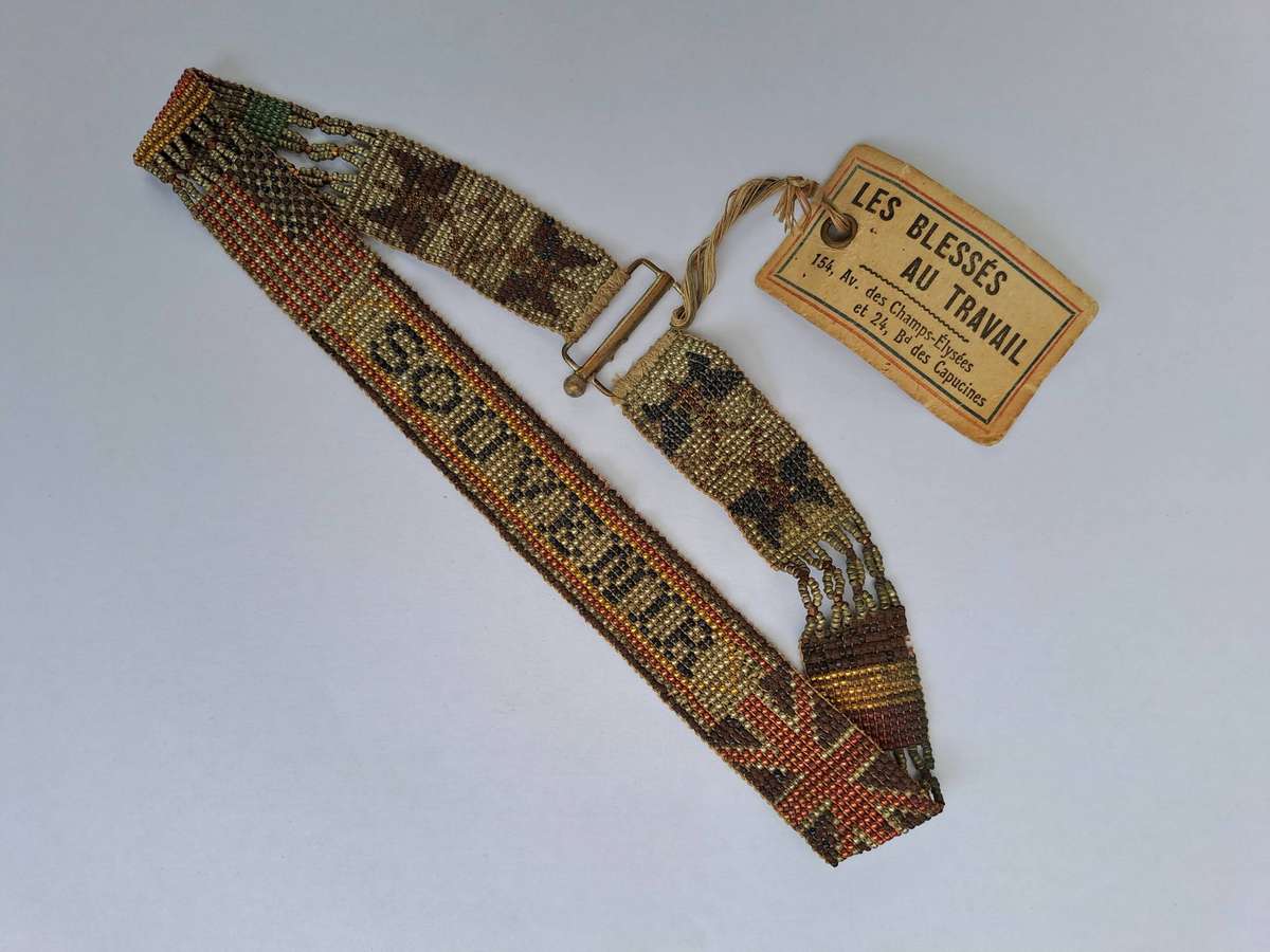 WW1 souvenir beaded 'bracelet' issued to soldiers in the line of duty.