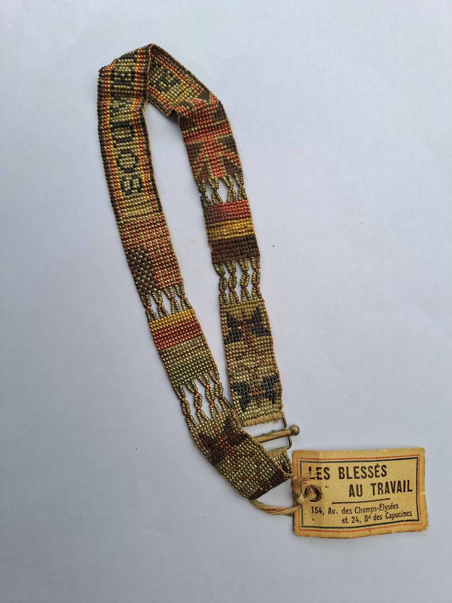 WW1 souvenir beaded 'bracelet' issued to soldiers in the line of duty.